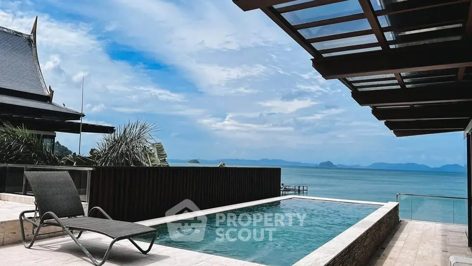 Stunning oceanfront pool with panoramic sea views and modern architecture.