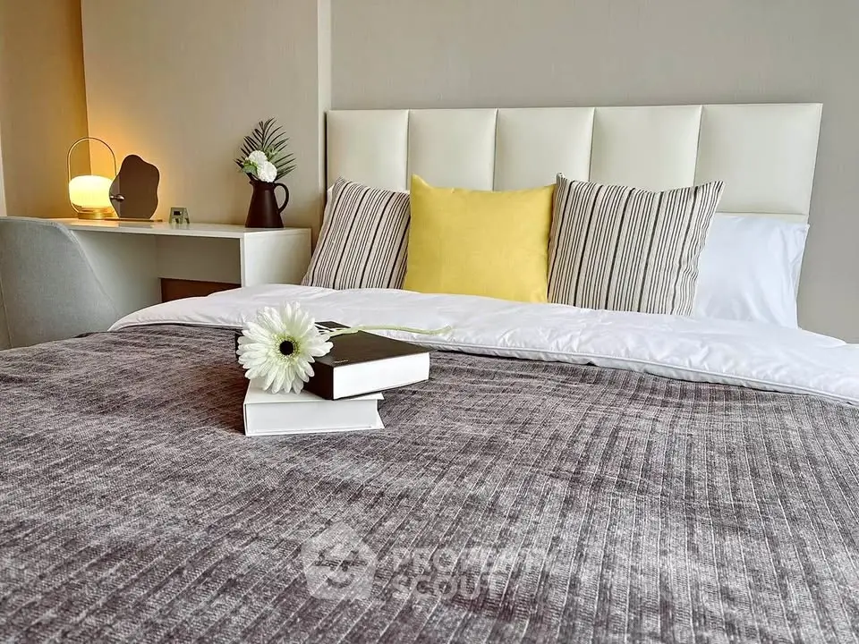 Cozy bedroom with stylish decor and plush bedding, perfect for relaxation and comfort.