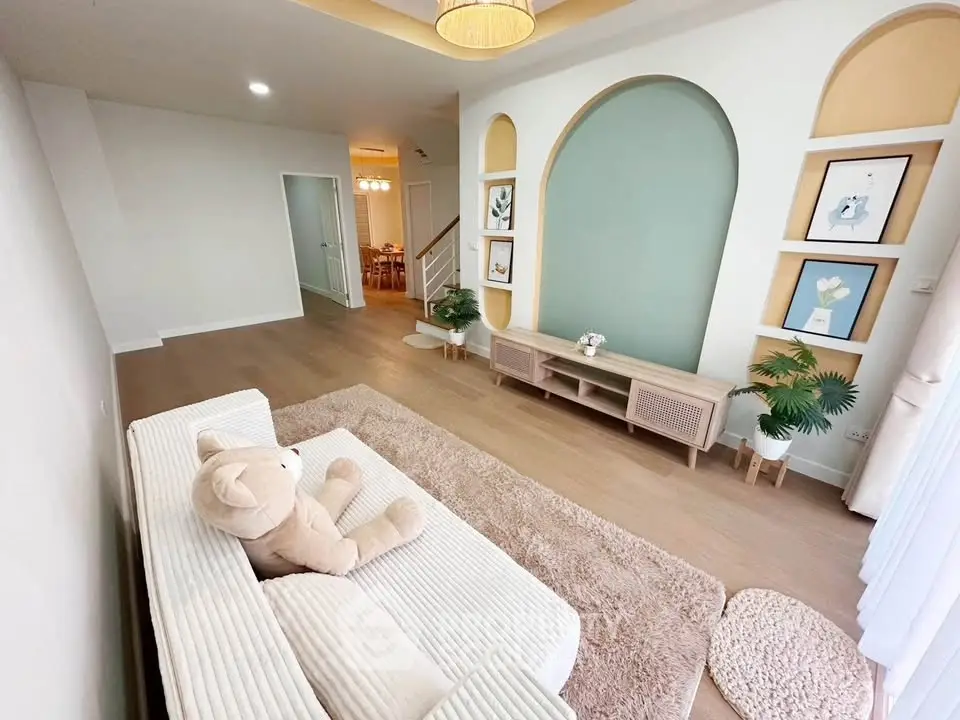 Spacious living room with modern decor and cozy ambiance