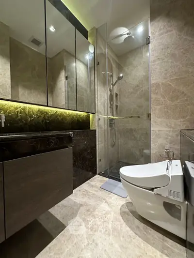 Luxurious modern bathroom with elegant marble finishes and sleek fixtures