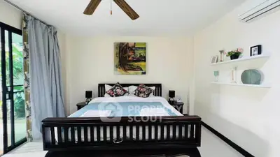 Cozy bedroom with elegant decor and natural light, featuring a stylish bed and modern air conditioning.