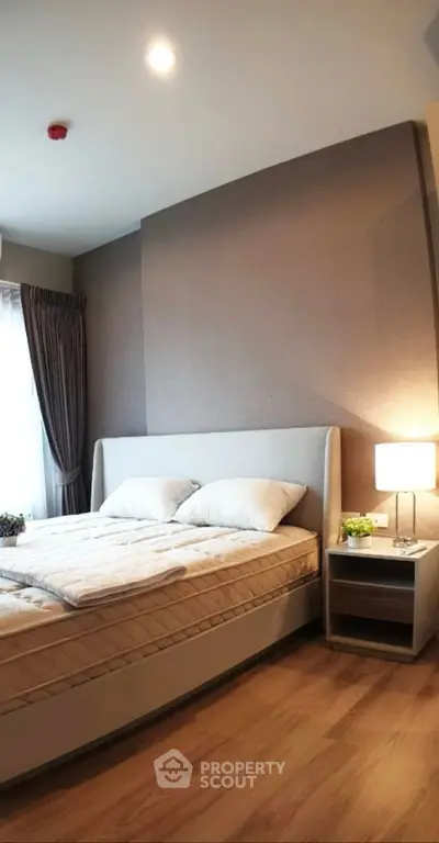 Modern bedroom with stylish decor and cozy ambiance