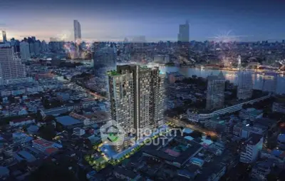 Stunning aerial view of modern high-rise building with city skyline and river backdrop at night.