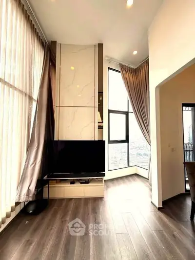 Luxurious high-rise living room with floor-to-ceiling windows and modern decor