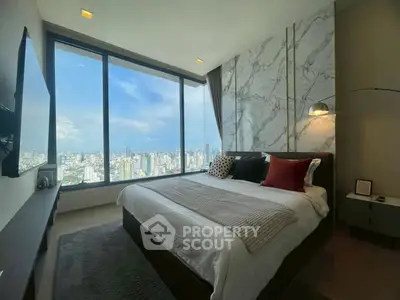 Luxurious bedroom with stunning city view and modern decor