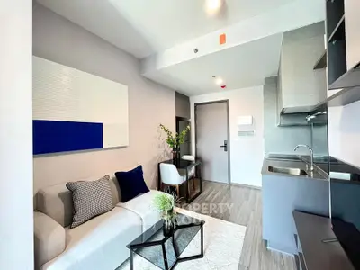 Modern living room with sleek kitchen in open layout apartment
