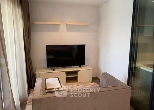 Cozy living room with modern TV setup and elegant decor