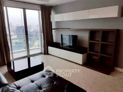 Modern living room with city view, sleek furniture, and large windows.