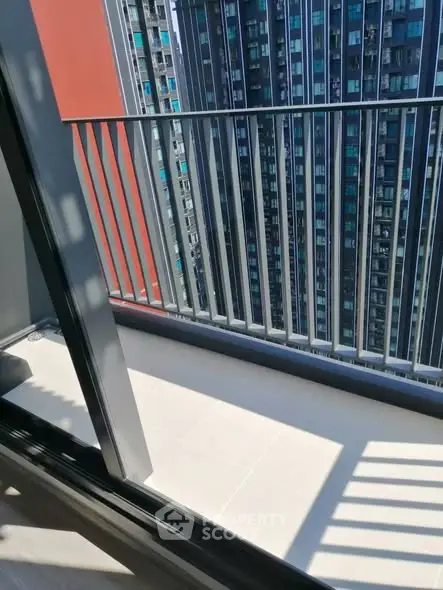 Modern balcony with cityscape view in high-rise apartment