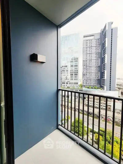 Modern balcony with city view in high-rise apartment