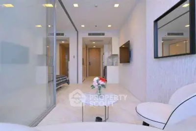 Modern living room with sleek design and elegant decor in a contemporary apartment.