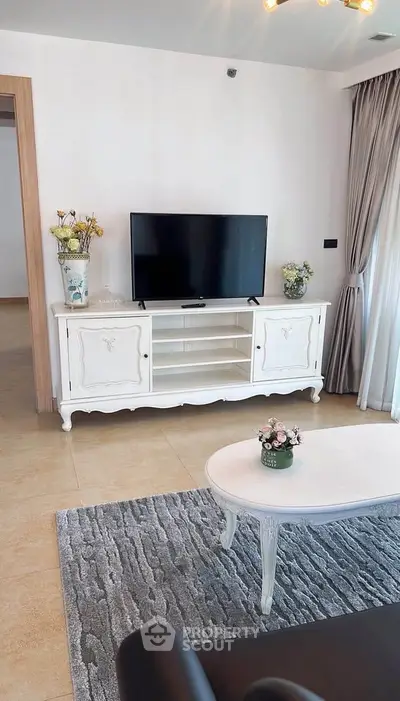 Elegant living room with stylish TV stand and cozy decor