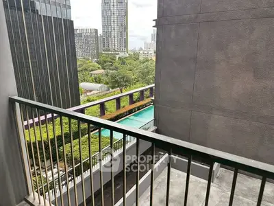 Modern urban balcony with city view and pool, ideal for luxury living.