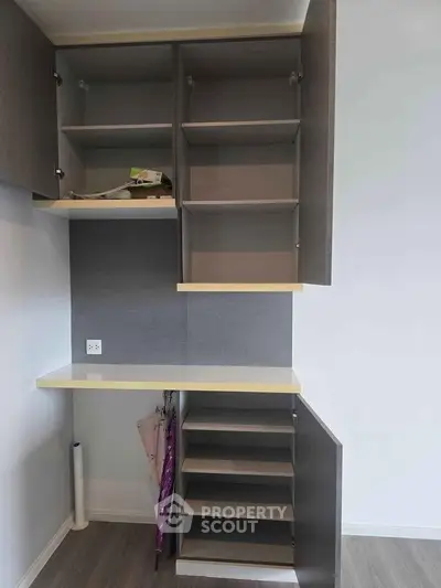 Modern kitchen storage cabinets with sleek design and ample shelving space.