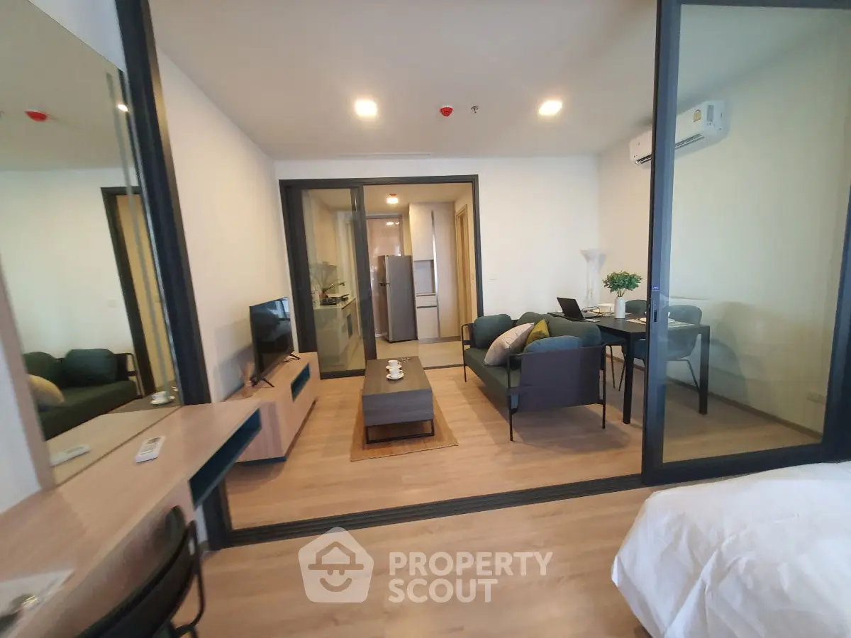 Modern living room with open layout and stylish furniture in a contemporary apartment.