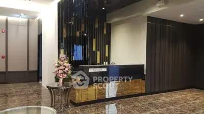 Luxurious modern lobby with elegant marble flooring and stylish reception desk