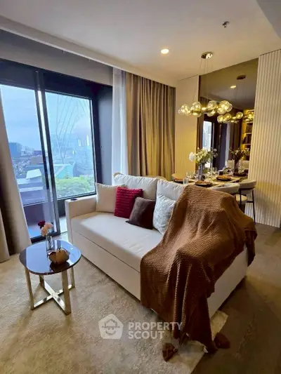Luxurious living room with modern decor and stunning city view, perfect for urban living.