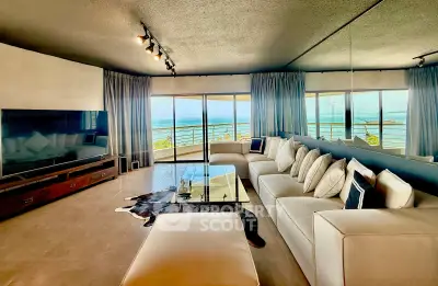 Luxurious living room with panoramic ocean views and modern decor