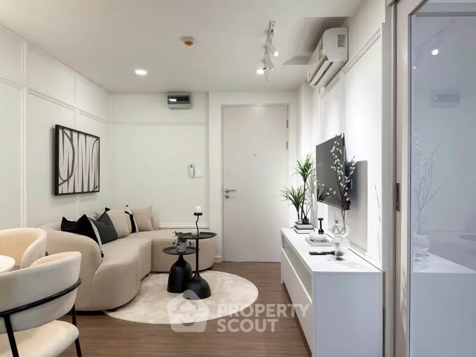 Modern living room with stylish decor and cozy seating area
