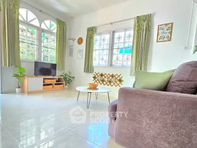 Bright and airy living room with modern decor and large windows