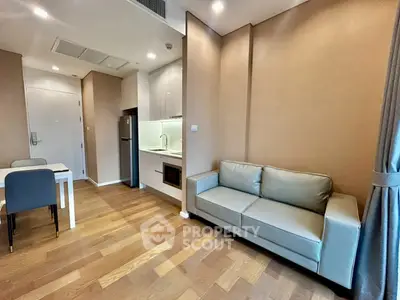 Modern living room with sleek kitchen in open layout apartment