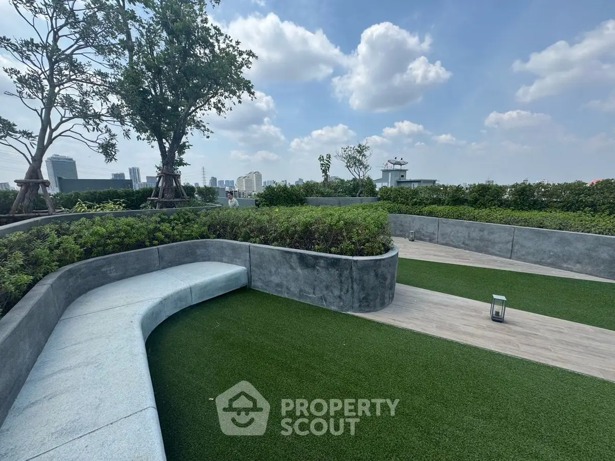 Stunning rooftop garden with lush greenery and city skyline views