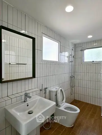 Modern bathroom with sleek fixtures and natural light