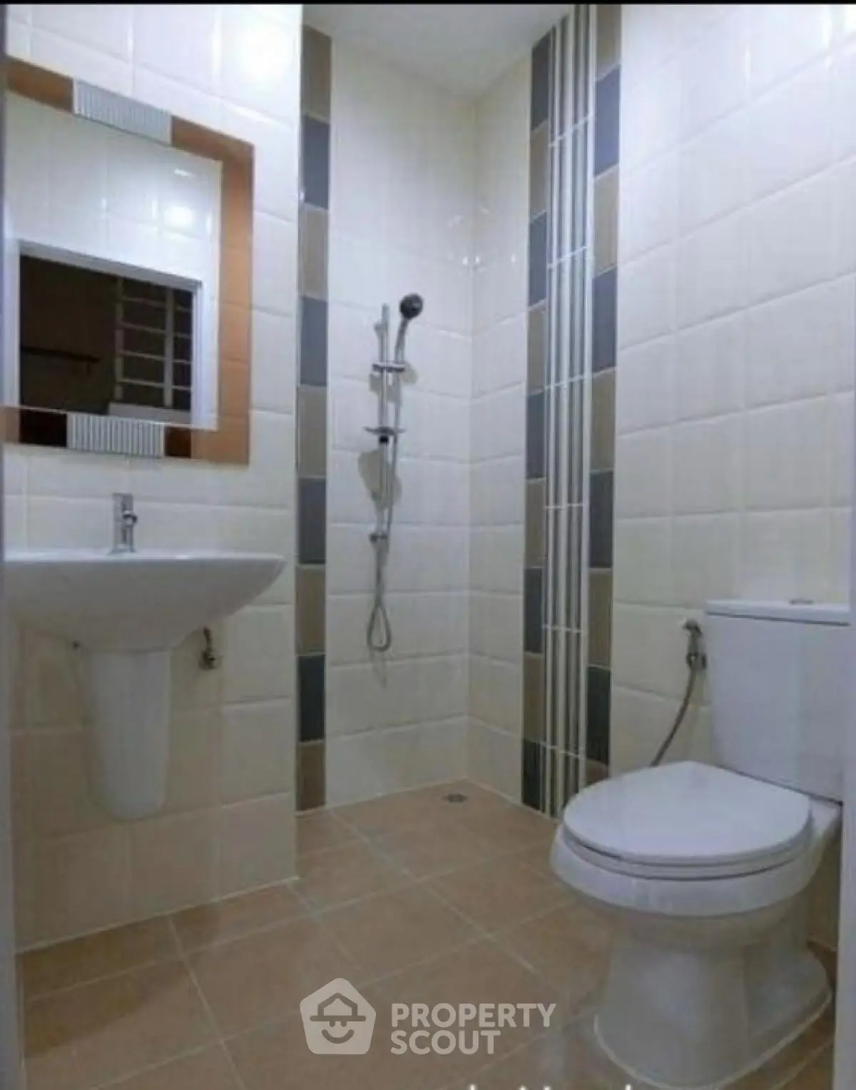 Modern bathroom with sleek shower and elegant tile design