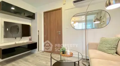 Modern living room with sleek furniture and stylish decor
