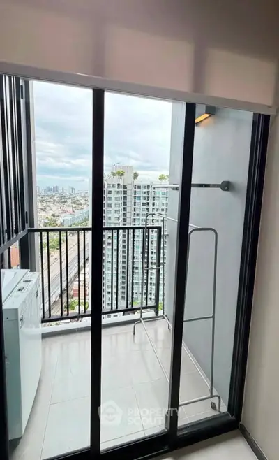 Modern balcony with city view, ideal for urban living, featuring sleek railings and ample space for relaxation.