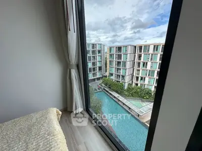 Modern apartment with stunning pool view from large window