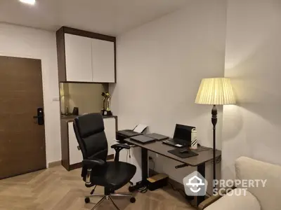 Modern study room with sleek desk and comfortable chair in elegant apartment