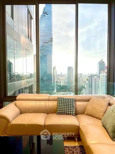 Luxurious living room with stunning city view from high-rise apartment
