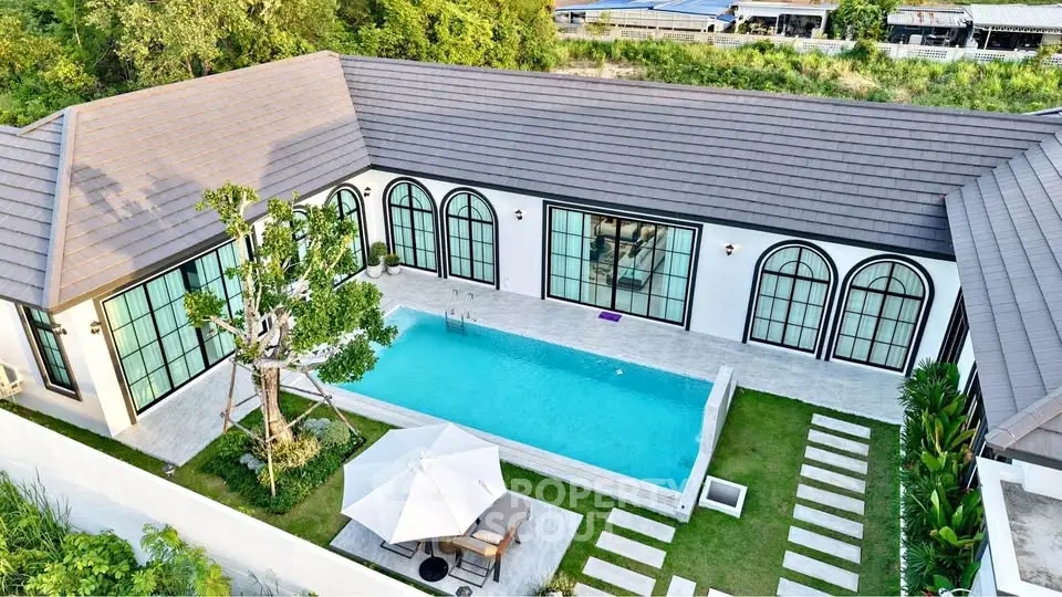 Luxurious villa with private pool and modern design, perfect for serene living.