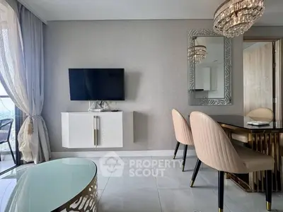 Elegant living room with modern decor and balcony view