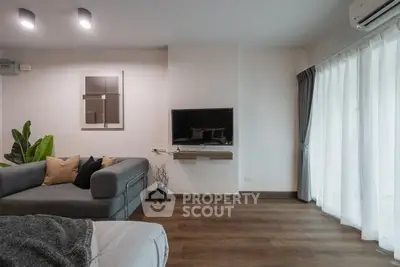 Modern living room with sleek decor and natural light