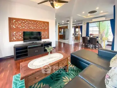 Spacious living room with elegant decor and open layout in modern home.