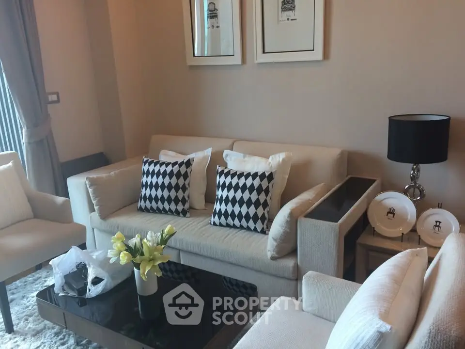 Elegant living room with modern decor and cozy seating area