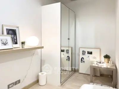 Modern minimalist bedroom with mirrored wardrobe and stylish decor