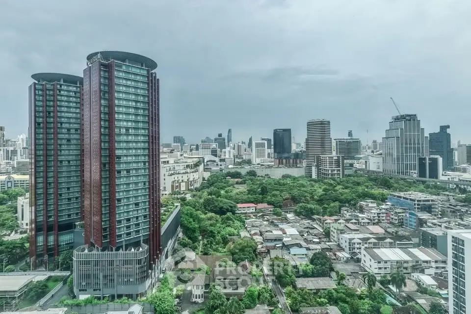 Stunning cityscape view showcasing modern high-rise buildings and lush greenery in an urban setting.