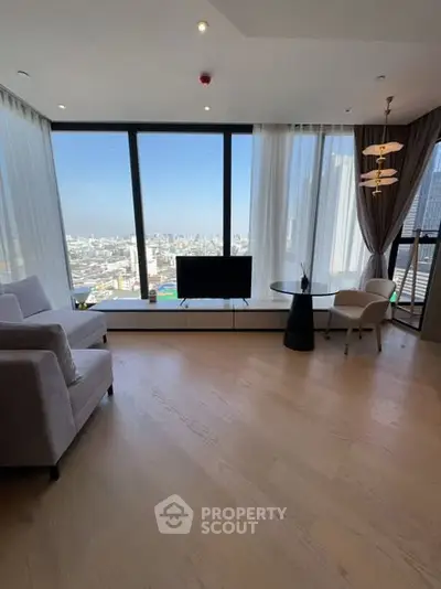 Luxurious living room with panoramic city view and modern furnishings