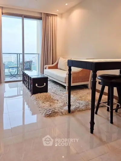 Modern living room with elegant furniture and city view balcony, perfect for urban living.