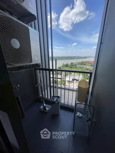 High-rise balcony with stunning river view and air conditioning unit