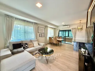 Spacious modern living room with elegant decor and natural light