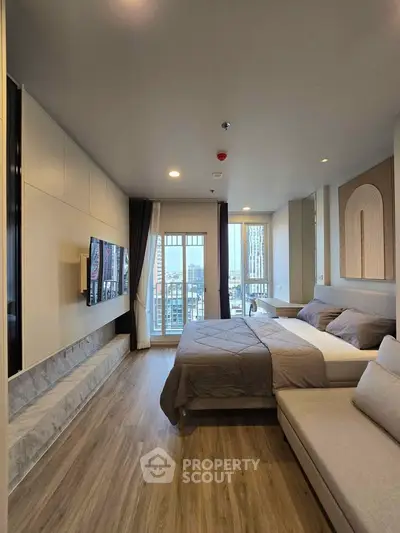 Modern bedroom with city view and stylish decor