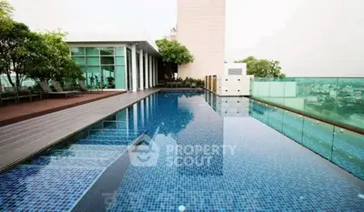 Luxurious rooftop pool with stunning city views and modern design.