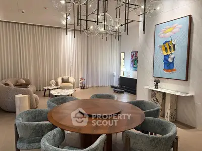 Luxurious modern living room with elegant chandelier and stylish furniture