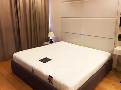 Spacious bedroom with modern design and cozy ambiance