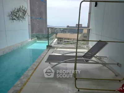 Luxurious balcony with private pool and stunning city view, perfect for relaxation.