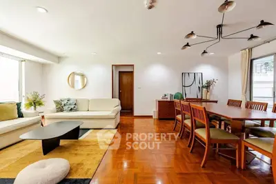 Spacious living room with elegant dining area and modern decor